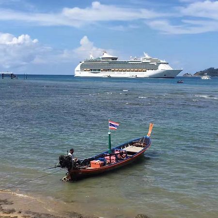 Patong Heights Hotel Exterior photo A longtail boat in Phuket